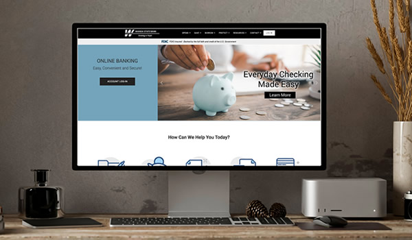 Computer Mockup - showcasing Wanda State Bank website at wandastatebank.com